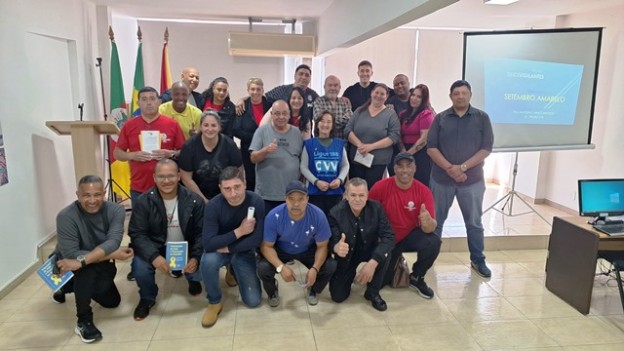 Participantes e palestrantes no final do evento